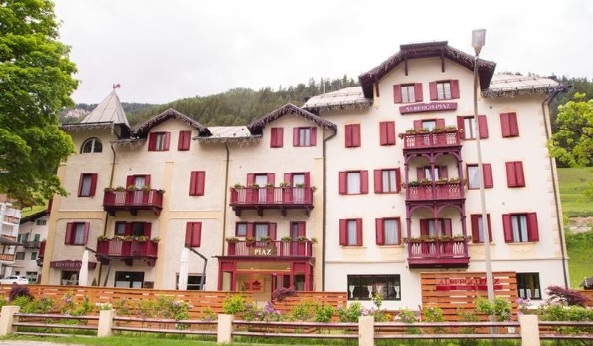 Hotel Piaz - Facade of the hotel in the typical style of Val di Fassa in Trentino Alto Adige