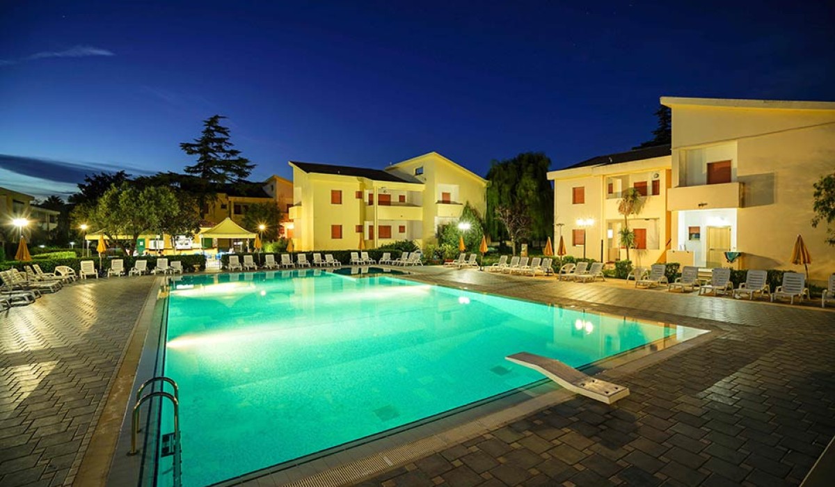 Apulia Residence Sellia Marina - Night View by the Pool