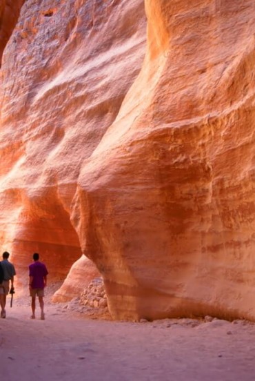 The Siq, the narrow slot canyon serving as the entrance passage to the hidden city of Petra, Jordan