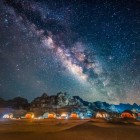 The Milky Way above the red desert of Wadi Rum in Jordan