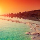 Spectacular sunrise on the shores of the Dead Sea in Jordan