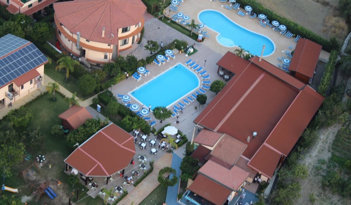 Aquilia Holiday Village Resort - Drone view of the two pools of the facility, one of which is for children