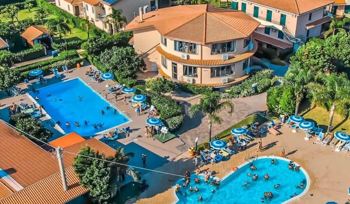 Club Esse Aquilia Beach Village - Aerial view of the two pools of the facility.