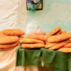 Selling of typical Arabic bread in an alley of the Medina of the Holy City of Moulay Idriss