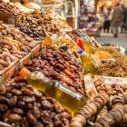 Sale of figs and dates in a typical souk in the Medina of Fes, Morocco