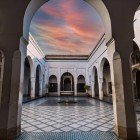 Bahia Palace highlighting the traditional Arabic tiles and fountain in Marrakesh, Morocco