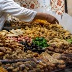 Typical Moroccan sweets on the counter of a traditional pastry shop in Djemaa El Fna Square in Marrakech, Morocco