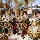 Traditional Moroccan handcrafted lanterns made of wrought iron and glass for sale in the souks of the Medina of Marrakech