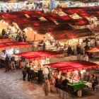 Typical Moroccan stalls in Djemaa El Fna Square in Marrakech, Morocco