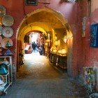 Typical alley in the Medina of Marrakech, Morocco, with souks of handcrafted products and local souvenirs