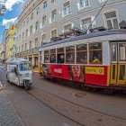 Characteristic vintage tram on the streets of Lisbon