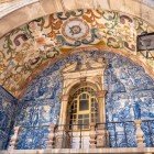 Details of the entrance to Porta da Vila, highlighting the Passion of Christ depicted with Azulejos, beautiful typical Portuguese tiles