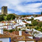 Details of the historic center of Óbidos with its typical white medieval houses