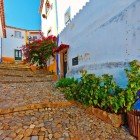 Details of the medieval cobblestone paving in the center of Óbidos, Portugal