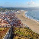 Aerial view of the city of Nazaré and Praia da Nazaré Beach, Portugal