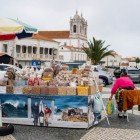 Street vendor of typical products in the Largo de Nossa Senhora da Nazaré square