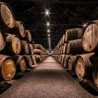 An ancient cellar in the city of Porto with barrels of fine Portuguese wine