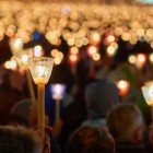 Evening candles during a religious ceremony in the square in Fatima, Portugal