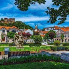 In perspective, the Leiria castle overlooking the old town of Fatima in Portugal