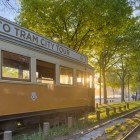 Historic yellow wooden tram 287 moving through the streets of Porto, a symbol of the city