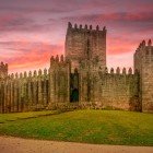 Sunset view of the Castle of Guimarães, dating back to the medieval era and also known by the name of São Mamede