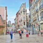 View of downtown Coimbra, noting the architecture of the old houses with very narrow profiles, now mostly occupied by historic cafés