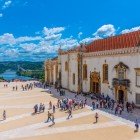 University of Coimbra, view of the square and the exterior with the Mondego River in the background