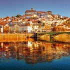 View of Coimbra and the university citadel located on high ground. Founded in 1220, the university is the oldest in Portugal