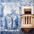 Igreja da Misericórdia is a baroque church not far from the historic center of Evora, in the Alentejo region of Portugal. The detail shows a depiction made with azulejos, the famous and traditional Portuguese tiles