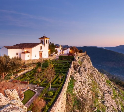 Marvão Castle at sunset, a small and picturesque village in the Alentejo, Portugal, offering a spectacular view of the landscape