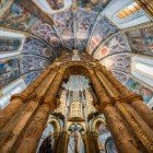 Of impressive beauty is the dome of the 12th-century round church at the Convent of Christ. The church is located within the Templar Castle complex in the city of Tomar, Portugal