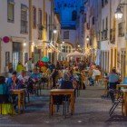 The medieval streets of Évora, characterized by beautiful cobblestone paving, are filled with small restaurants and ancient cafés where you can enjoy local specialties