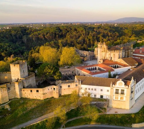 Aerial view of the Convent of Christ and the Templar Castle (UNESCO World Heritage) built on an ancient Roman worship site, reflecting the long history of the West