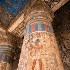 Detail of the paintings and hieroglyphs on the columns of Medinet Habu (temple of Ramses III), on the west bank of Luxor in Egypt