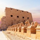 The Karnak Temple Complex (of which the Great Temple of Amun and the Temple of Luxor are only a part) is located on the east bank of the Nile, and its construction parallels the history of ancient Egypt