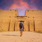 Temple of Edfu at sunset dedicated to the god Horus in the city of Edfu on the west bank of the Nile, between Esna and Aswan, where the river forms a wide and remarkably beautiful bend