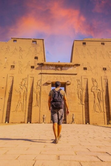 Temple of Edfu at sunset dedicated to the god Horus in the city of Edfu on the west bank of the Nile, between Esna and Aswan, where the river forms a wide and remarkably beautiful bend