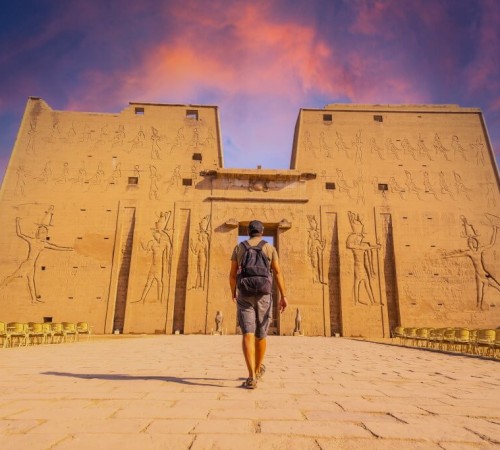 Temple of Edfu at sunset dedicated to the god Horus in the city of Edfu on the west bank of the Nile, between Esna and Aswan, where the river forms a wide and remarkably beautiful bend