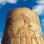 Temple of Kom Ombo, beautiful column with hieroglyphs and bas-reliefs depicting the god Haroeris