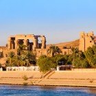 The Temple of Kom Ombo on the right bank of the Nile River in the Aswan Governorate. The temple was designed symmetrically with two sections, one dedicated to the god Sobek and the other to the god Horus