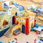 Typical Nubian house characterized by peculiar architecture with very vibrant colors