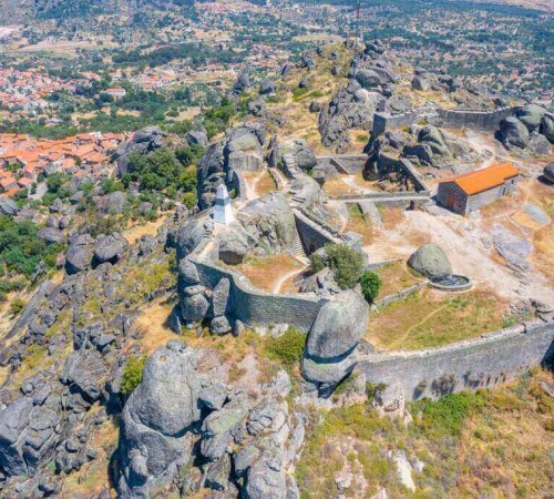 Aerial view of the Monsanto castle, a former freguesia in Portugal in the municipality of Idanha-a-Nova. Kown for its characteristic granite megalithic area and the presence of a fortress once owned by the Templars