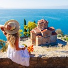 View of the Church of St. John at Kaneo in Ohrid, North Macedonia. It is a Macedonian Orthodox church situated on the cliff of Kaneo Beach overlooking the lake, and features a beautiful, panoramic walkway over the lake