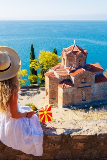 View of the Church of St. John at Kaneo in Ohrid, North Macedonia. It is a Macedonian Orthodox church situated on the cliff of Kaneo Beach overlooking the lake, and features a beautiful, panoramic walkway over the lake