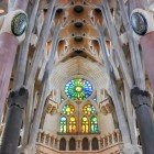 Sagrada Familia, details of the central nave with the beautiful colored stained glass windows