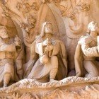 Details of some statues on the façade of the Sagrada Familia designed in Art Nouveau style by Gaudí